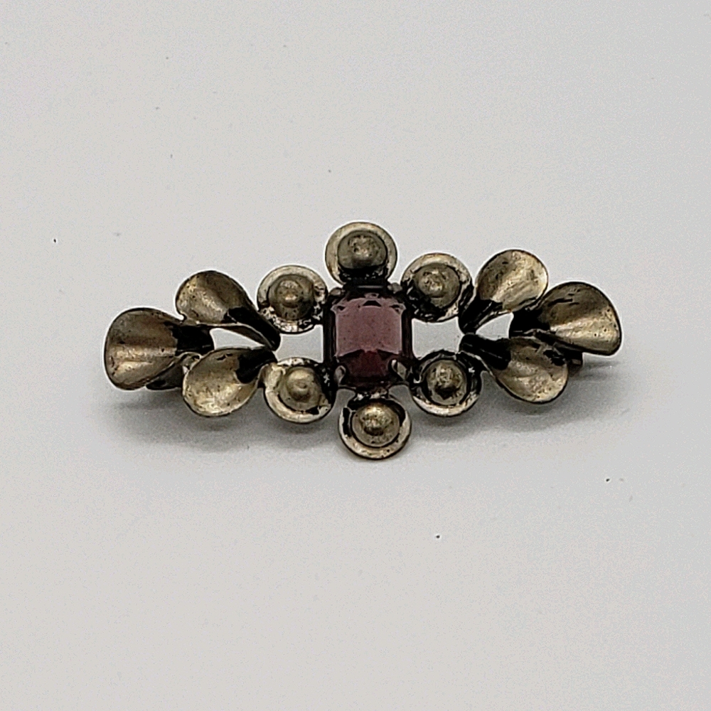Antique lavender glass and sterling silver pin